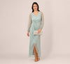 Crinkle Metallic Gown With Sheer Bishop Sleeves And Draped Details